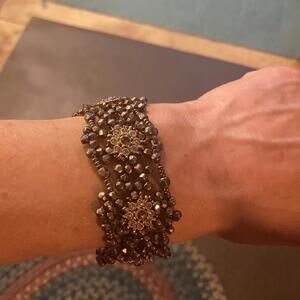 Feminine Amber tone rhinestone and brown bead stretch bracelet